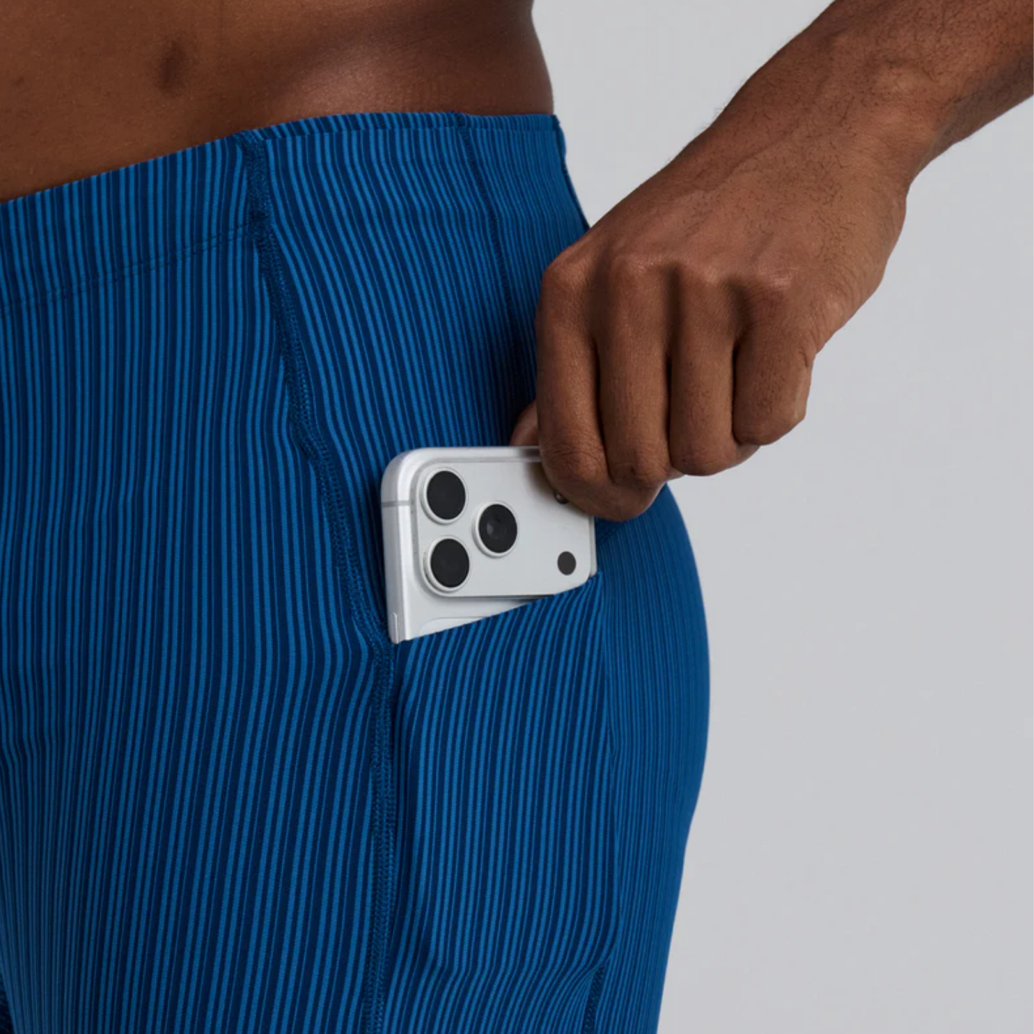 Bandit Running Striped Cadence™ 7 Pocket Lined Half Tights - Ink Blue/Aegean