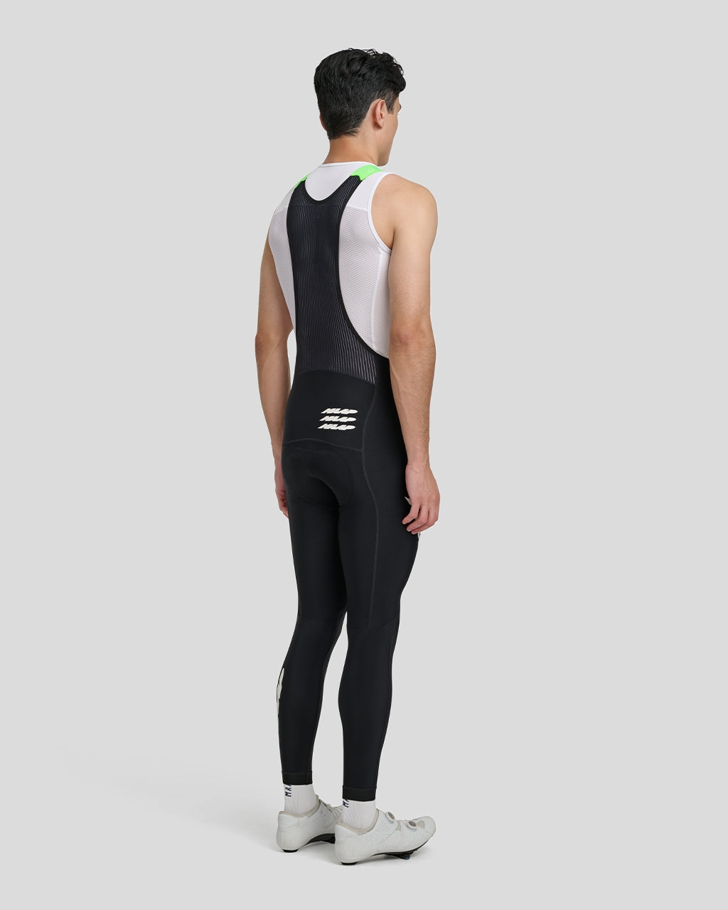 maap-eclipse-team-thermal-winter-tight-black-fluro-green-model-back