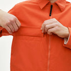 pas-normal-studios-off-race-utility-jacket-hibiscus-orange