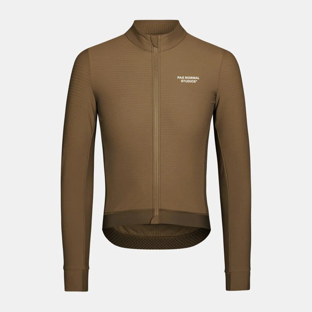 products › pas-normal-studios-essential-long-sleeve-jersey-ash-brown